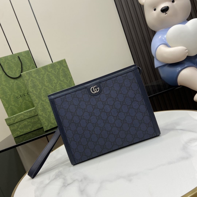 G*u*i clutch bags